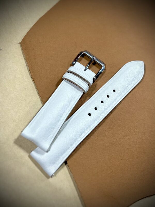 White leather watch band, handcrafted for a comfortable, modern fit.